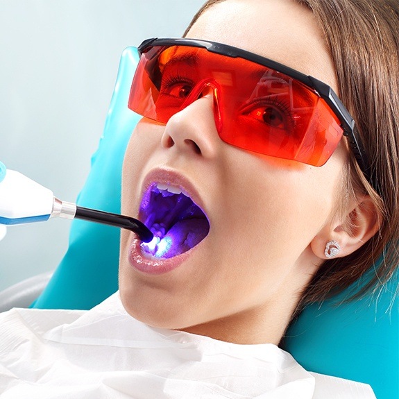 Child receiving dental sealants