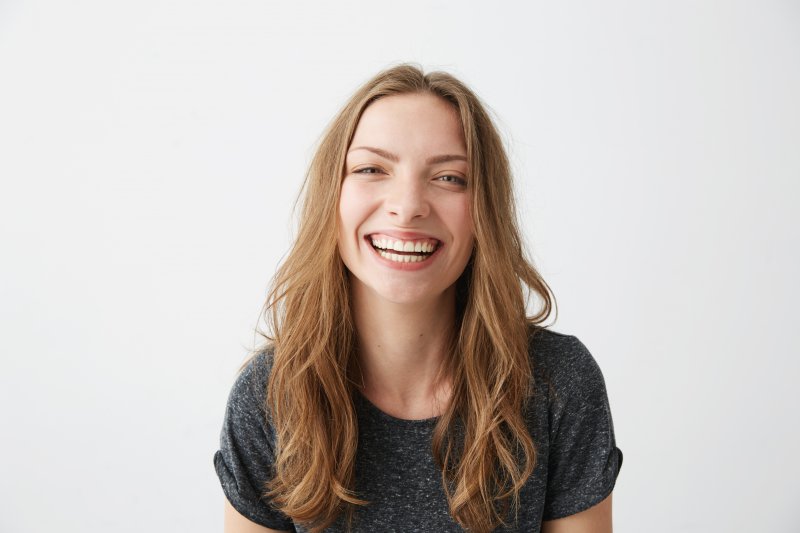 young woman smiling and laughing