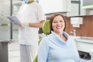 Woman at dental checkup with dentures