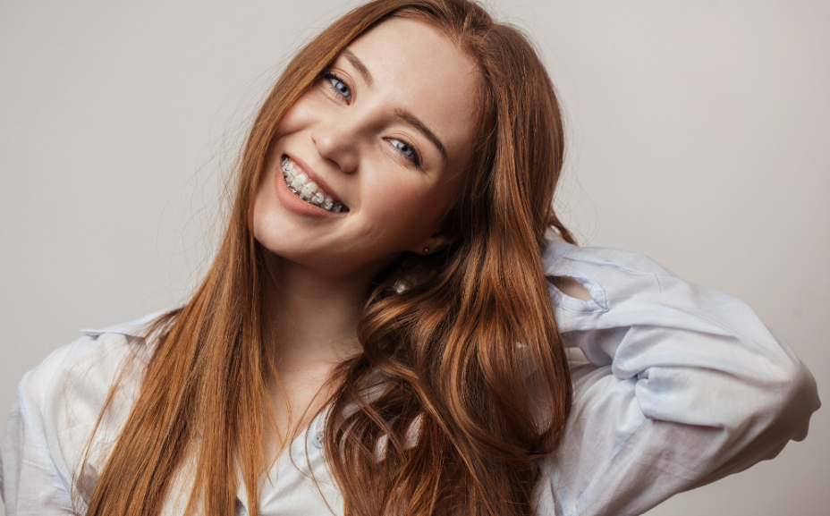 Teen girl with braces, smiling